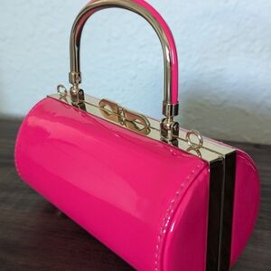 Elegant Pink Handbag with Gold Accents